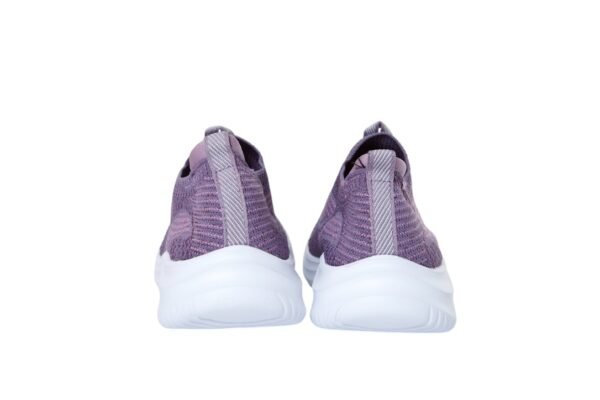 “Z‑ SwiftKnit Luxe slip‑on shoe emphasizing durable rubber outsole”