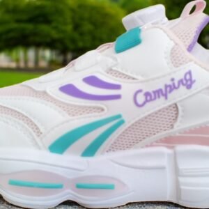 "Side profile of Z- Pixie Sprint Kids Sneakers displaying breathable mesh panels and durable synthetic leather overlays."